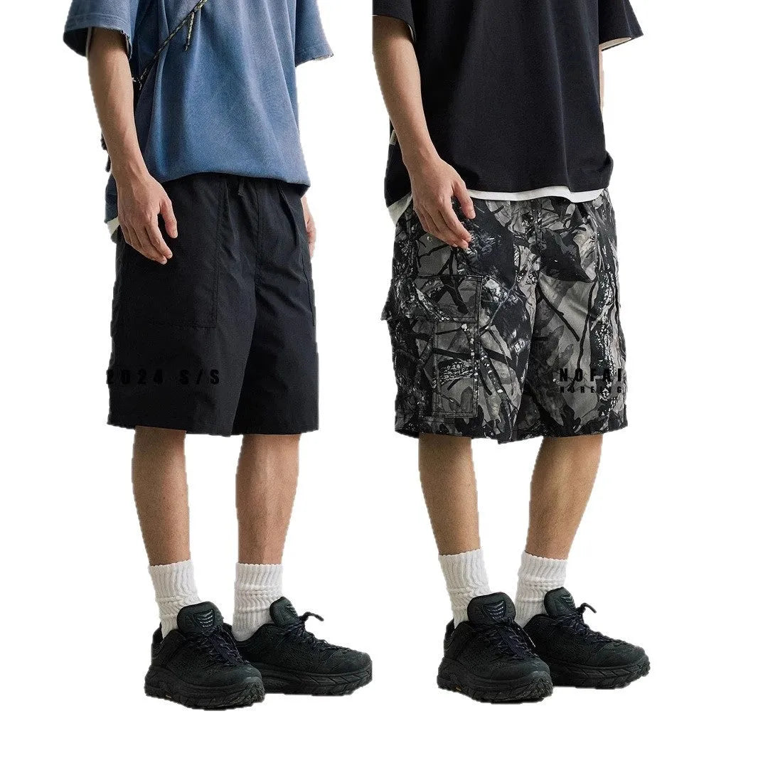 Loose straight-leg denim shorts with elastic waistband in black and army green colours