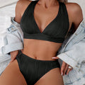 Women's black or pink halter strap nylon bikini swimsuit with top and shorts set