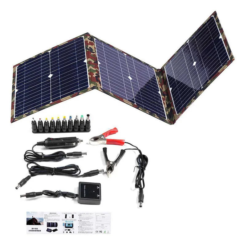 Black foldable 36W solar panel open showing three monocrystalline silicon cells with charging accessories