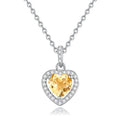 Women's sterling silver necklace with heart-shaped natural gemstone pendant on cross chain