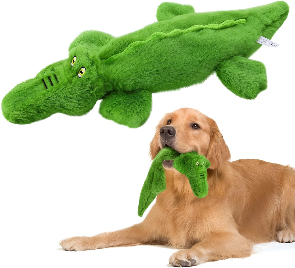 Green crocodile-shaped plush dog toy with no stuffing, squeaker in head, and crinkle paper tail