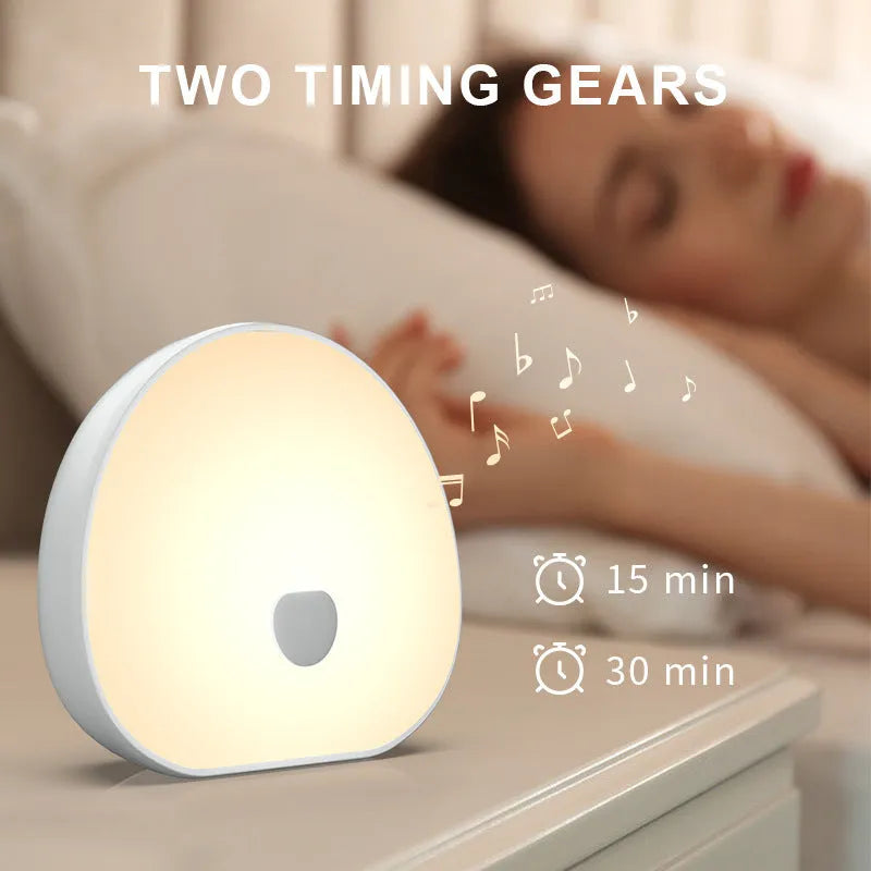 White rechargeable baby feeding comforter with music function for nighttime feeds