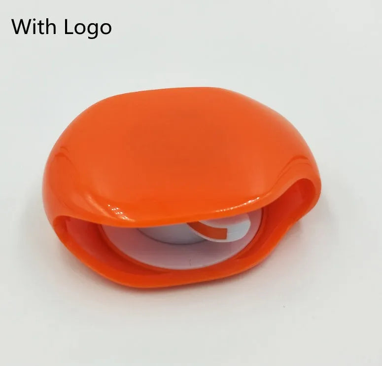 Automatic earphone cable winder retractor in assorted colours on a white background.