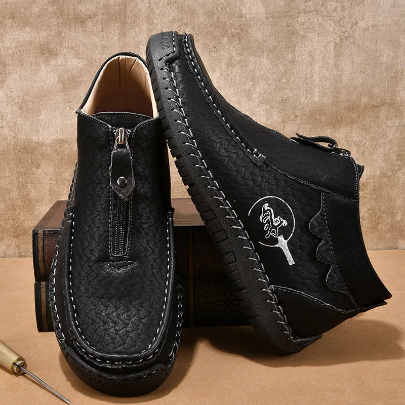 Men's leather slip-on loafers in black brown or grey colours showing round toe and rubber sole design