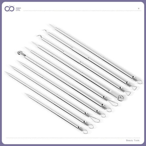 Four silver metal acne needles with fine pointed tips for blackhead removal.