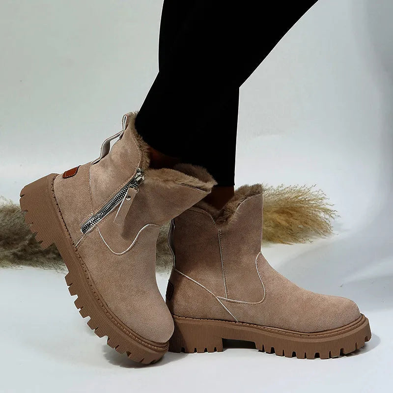 Women's black faux suede snow boots with thick plush lining and side zip closure