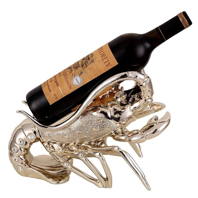 Lobster-shaped wine rack ornament in rose gold or silver, holding a wine bottle.