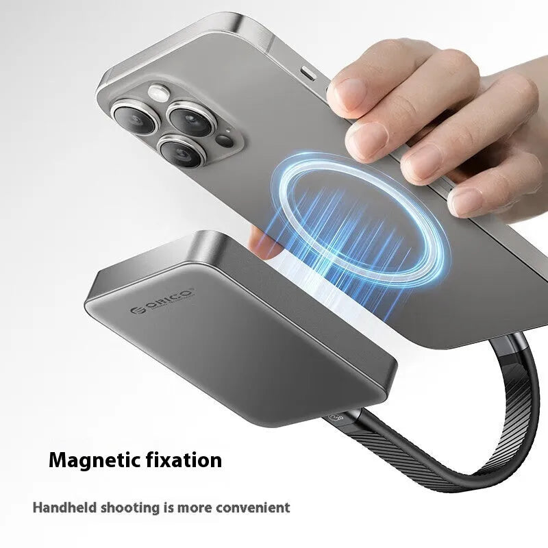 Grey magnetic mobile SSD with ultra-thin design and magnetic suction ring for portable storage expansion