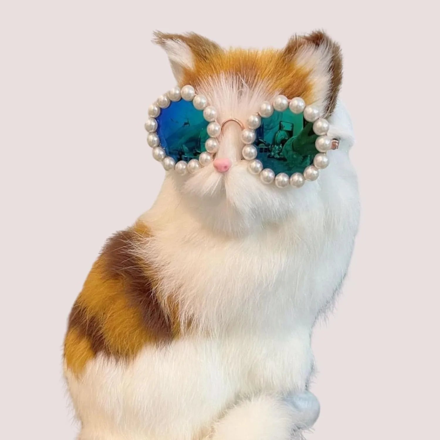 Pearl-rimmed round sunglasses for cats and dogs in multiple colours as costume accessories