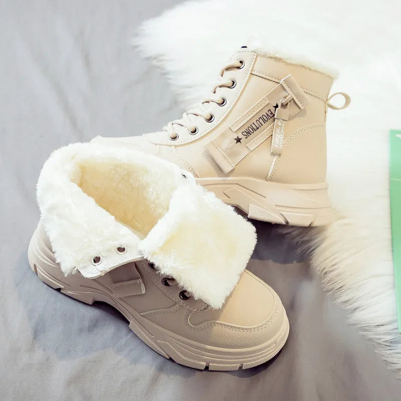 Women's plus size tall snow boot in black with front laces and a mid heel.