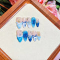 Blue hand-painted carved summer ice transparent plastic fake nails in four sizes XS S M L