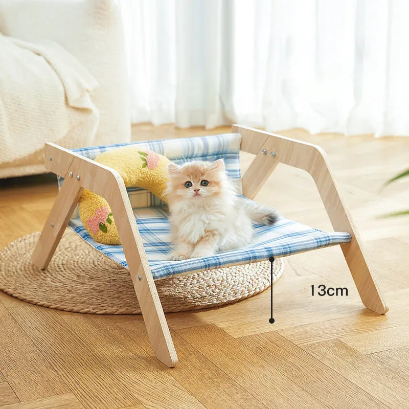 Wooden elevated cat bed hammock with soft cloth cushion in blue colour for indoor cats