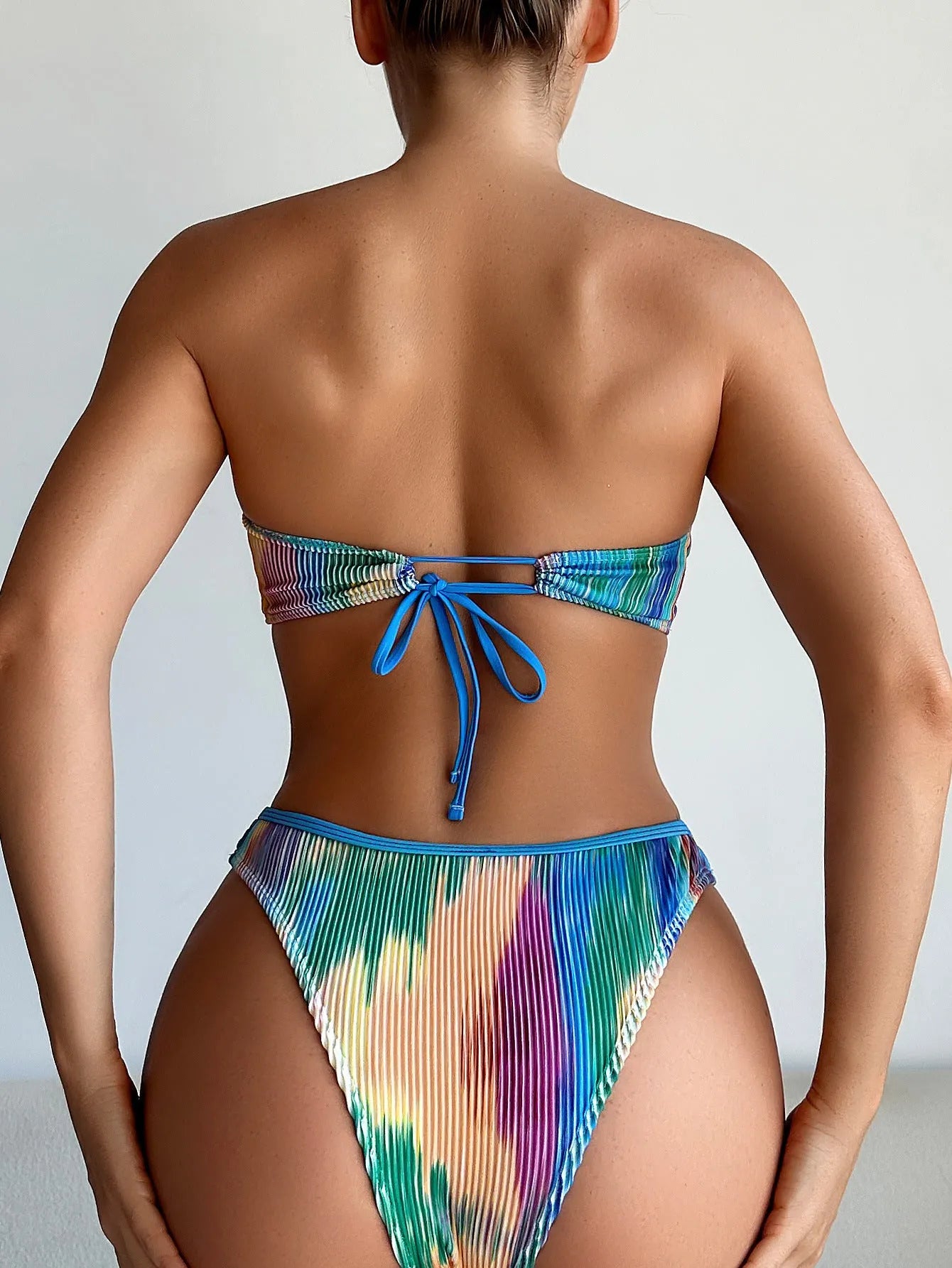 Colour printed tube top and briefs bikini set made of polyester fabric.