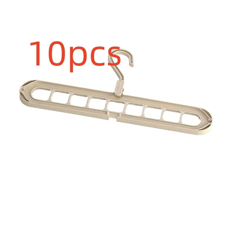 Plastic nine-hole clothes hanger with folding pant rack in a choice of five colours.