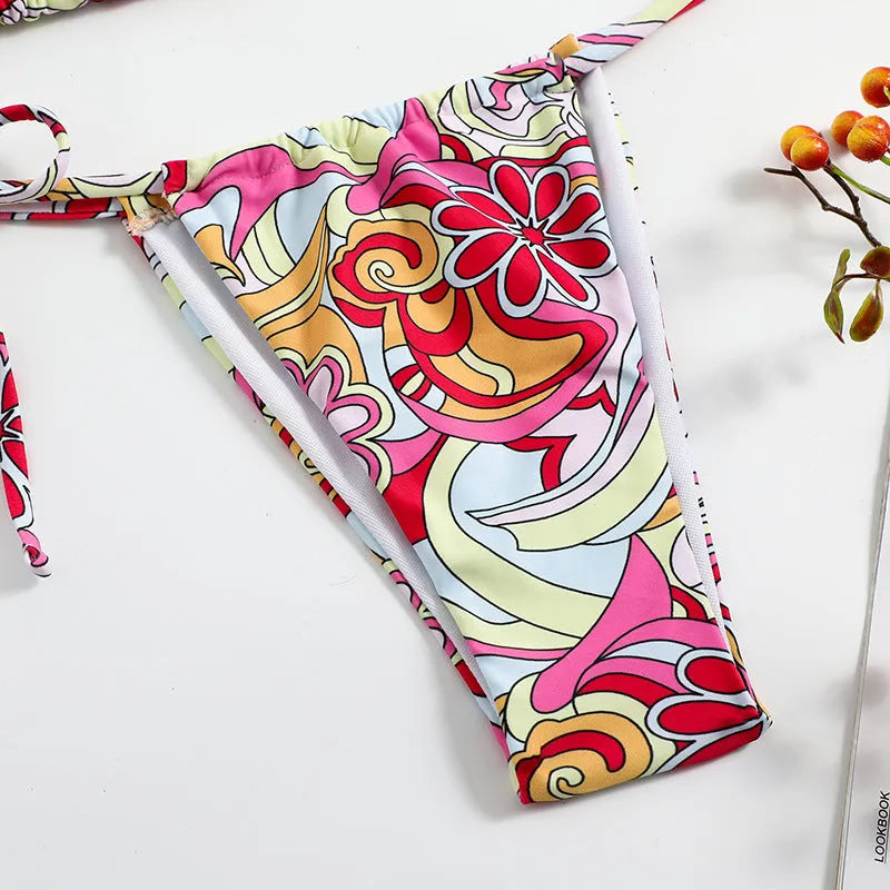 Women's triangle printed bikini with separate pieces and hanging neck design in multicolour pattern