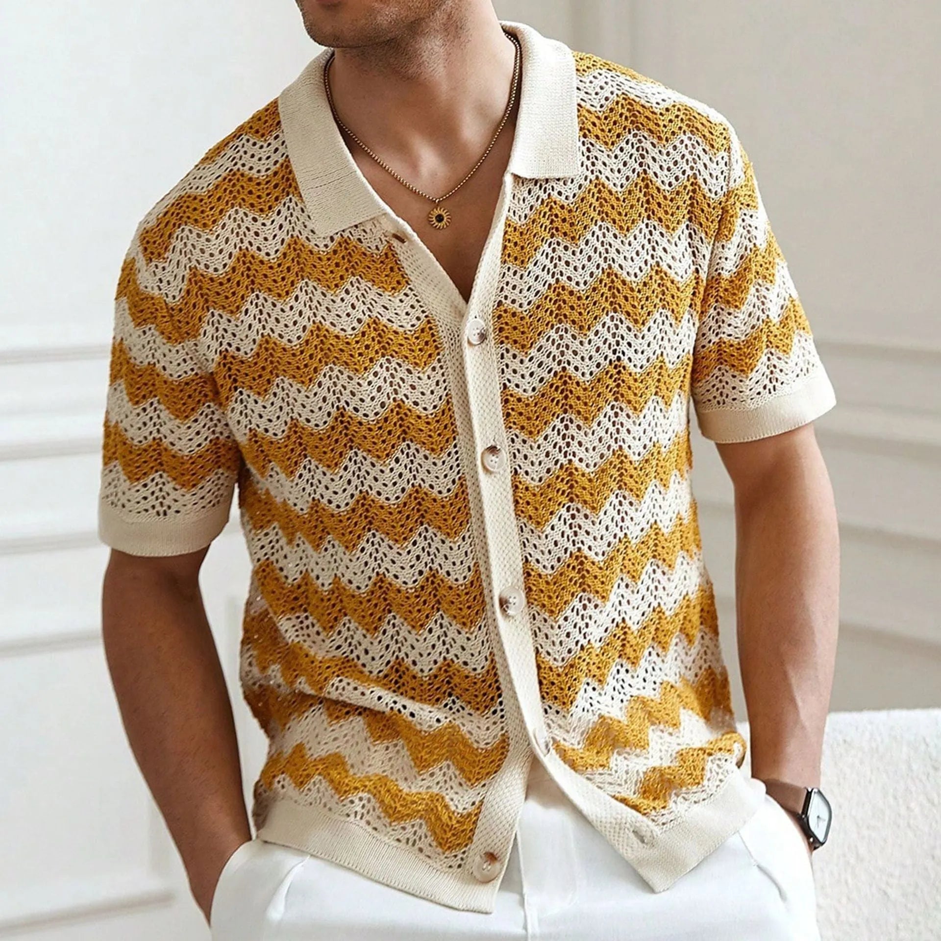 Yellow American-style corrugated short-sleeve sweater with flocking detail on a hanger