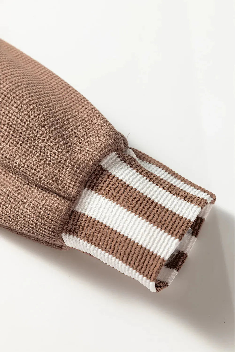 Straw yellow women's hoodie with waffle texture, striped patchwork, button neck, and drawstring waist.