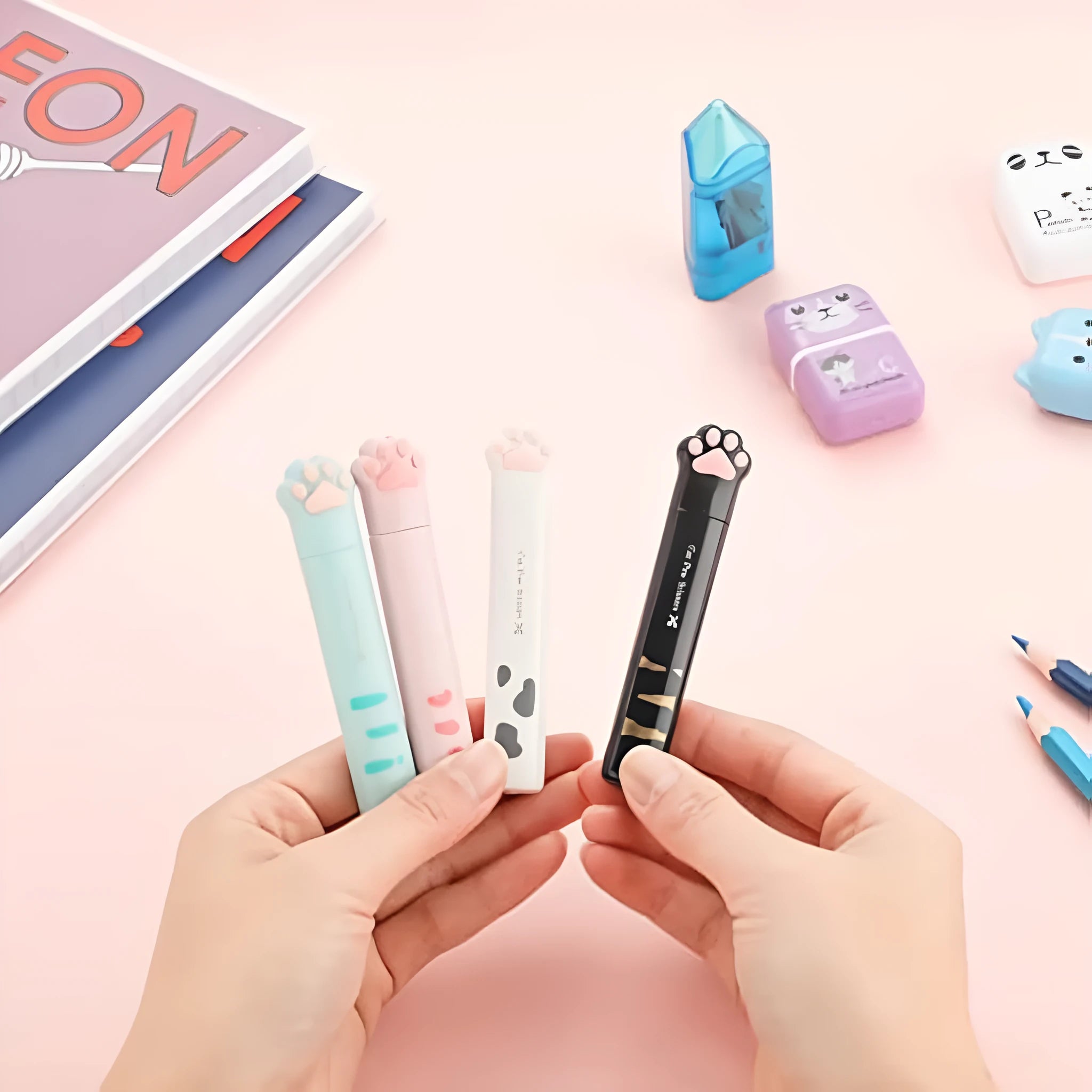 Mini folding scissors with cat paw design in pink, white, black, or blue colours