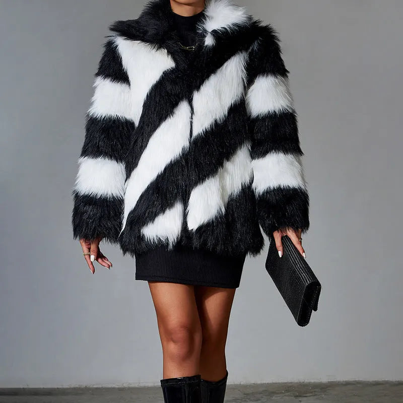 Women's faux fur coat with contrasting colour lapels and a fur collar.