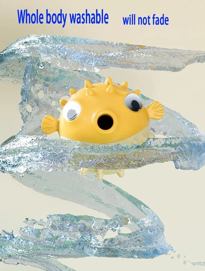 Green fish-shaped dog toy with squeaky bell and treat-dispensing opening