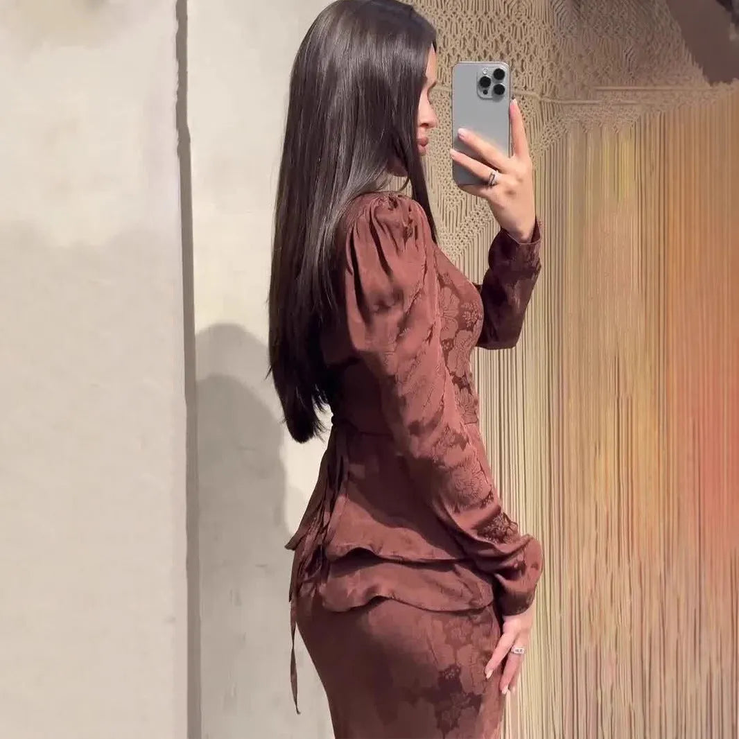 Dark brown retro-style long dress with floral pattern, long sleeves, and a faux two-piece slim fit design