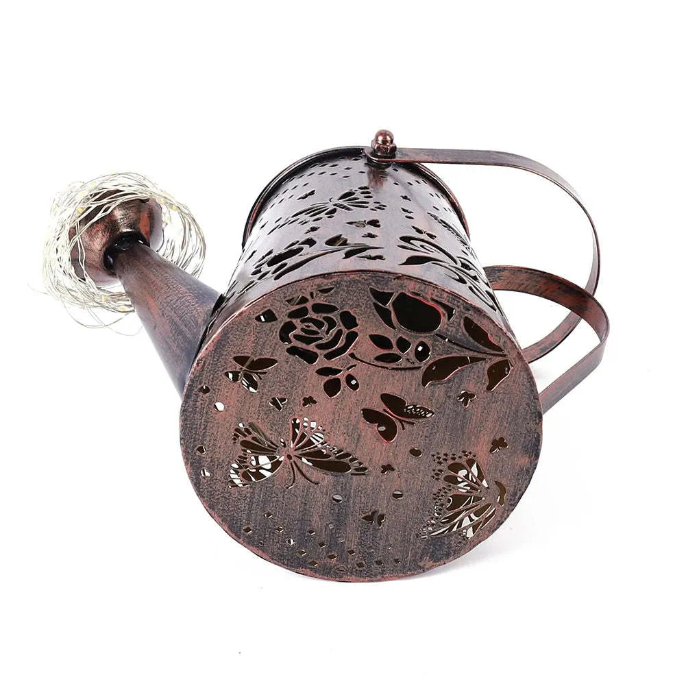 Solar garden lamp with butterfly pattern iron construction and tapered design