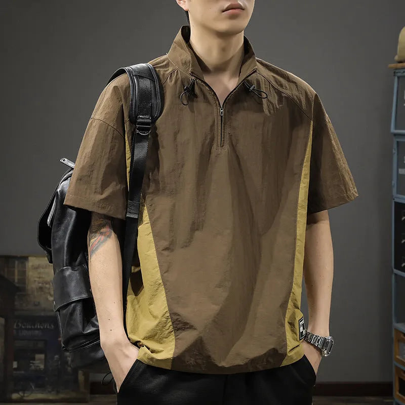 Man wearing a brown half-zip stand collar short sleeve shirt made of Ice Silk fabric.