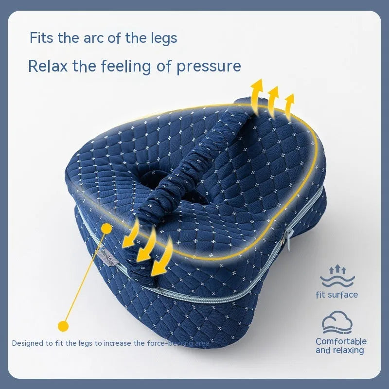 Love heart-shaped dark blue jacquard memory foam leg pillow for adult side sleepers.