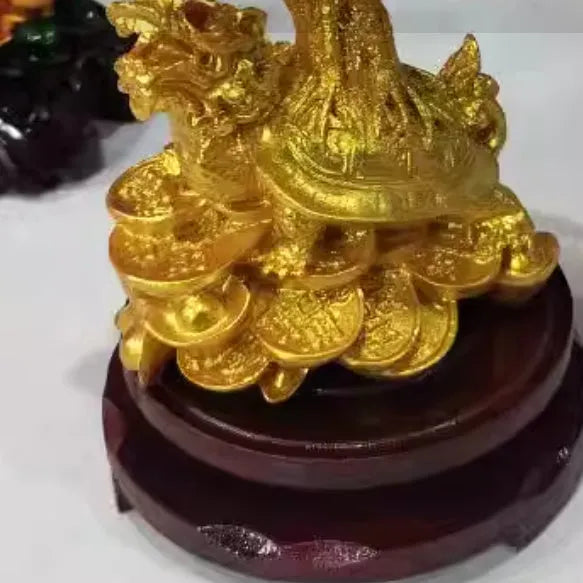 Citrine-coloured small water turtle money tree Feng Shui ornament made of resin.