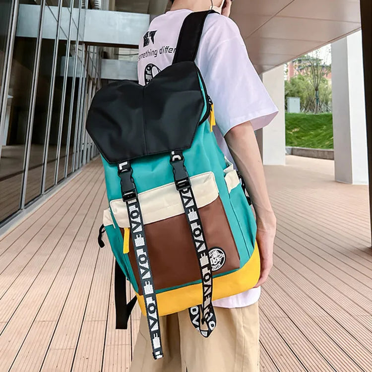 Oxford cloth backpack for junior high students in black, green or red with three carrying options.