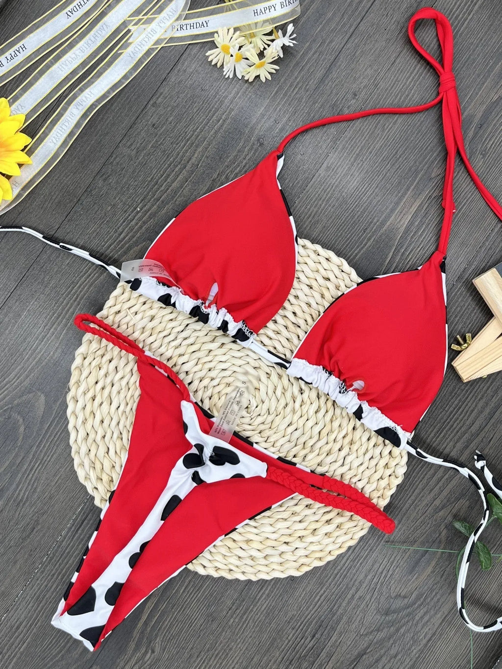 Red backless women's swimsuit with heart print design and high-cut legs