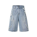 Distressed denim shorts with raw edge hem in straight cut hip hop style
