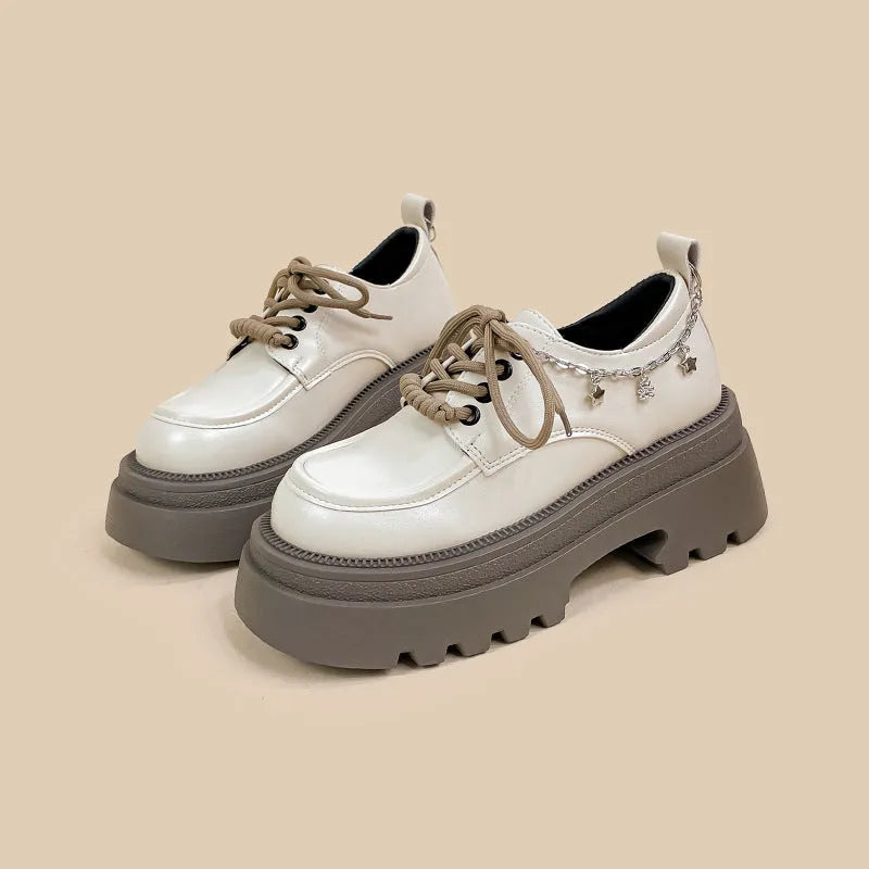 White British style platform Mary Jane shoes with a chunky 6-8cm heel and front lace-up.