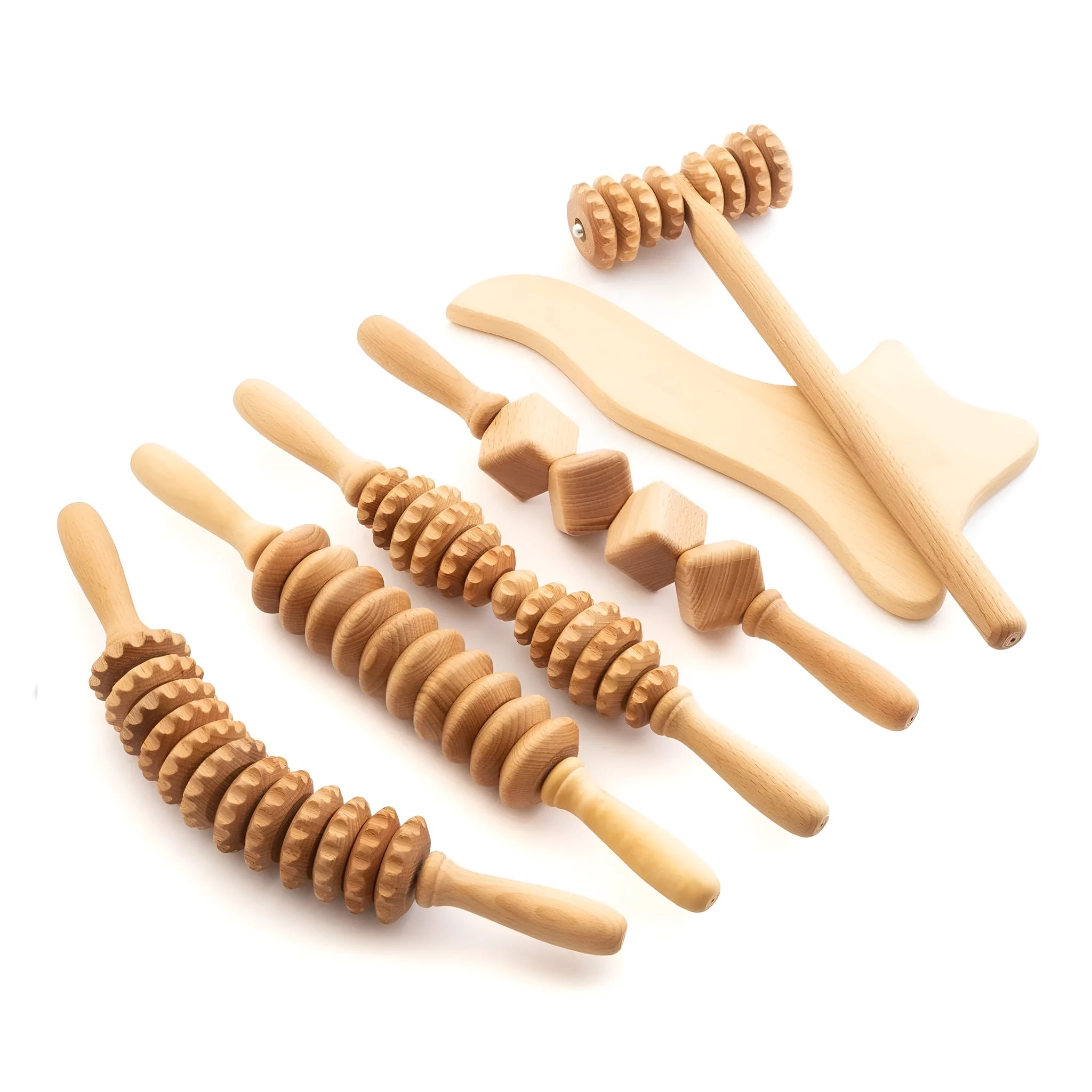 Beech wood massage roller set showing T-shaped roller, multiple wheel sets and a back massager on a plain surface.