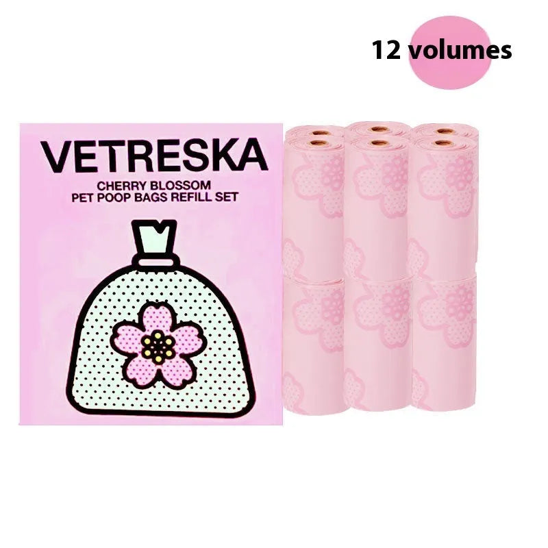 Portable dog poop bag dispenser capsule with scented inner bags in strawberry, orange and cherry blossom options