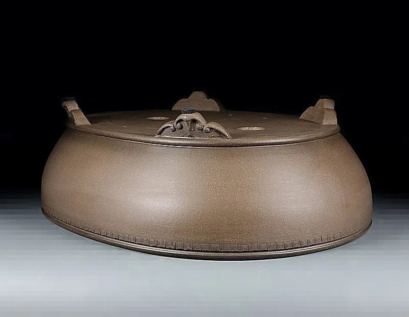 Handmade oval purple sand flowerpot in black mud green, measuring 50x39.5x16cm.