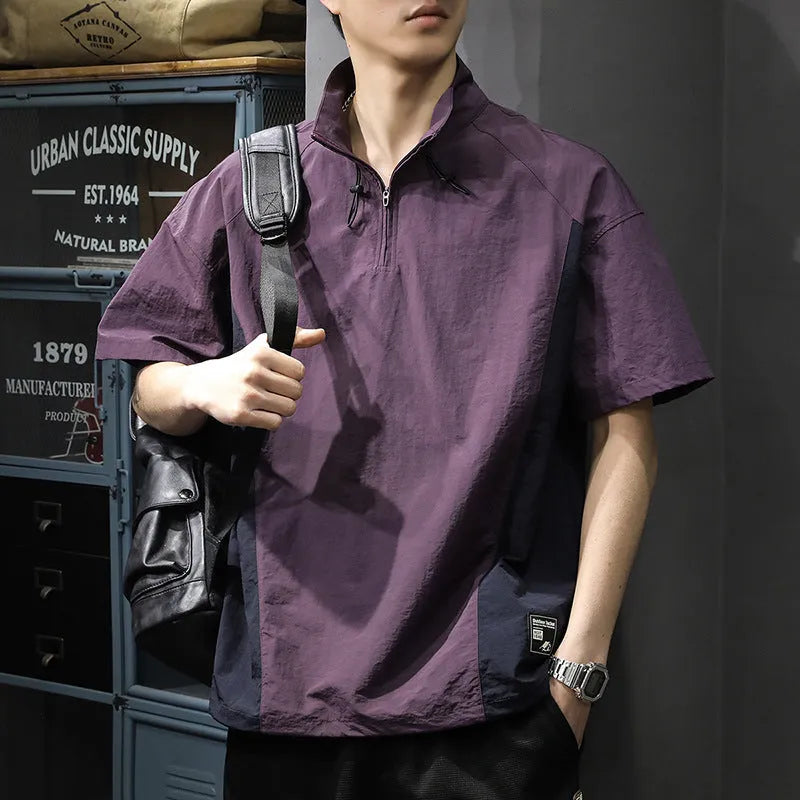 Man wearing a brown half-zip stand collar short sleeve shirt made of Ice Silk fabric.