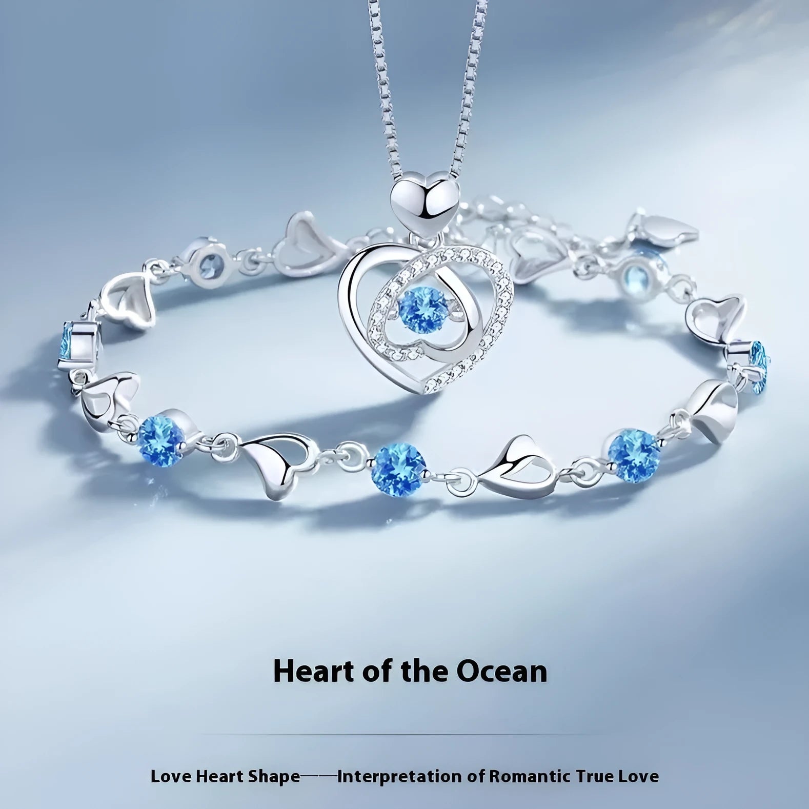 Blue diamond electroplated copper jewellery set with geometric heart pendant and mixed gem inlay