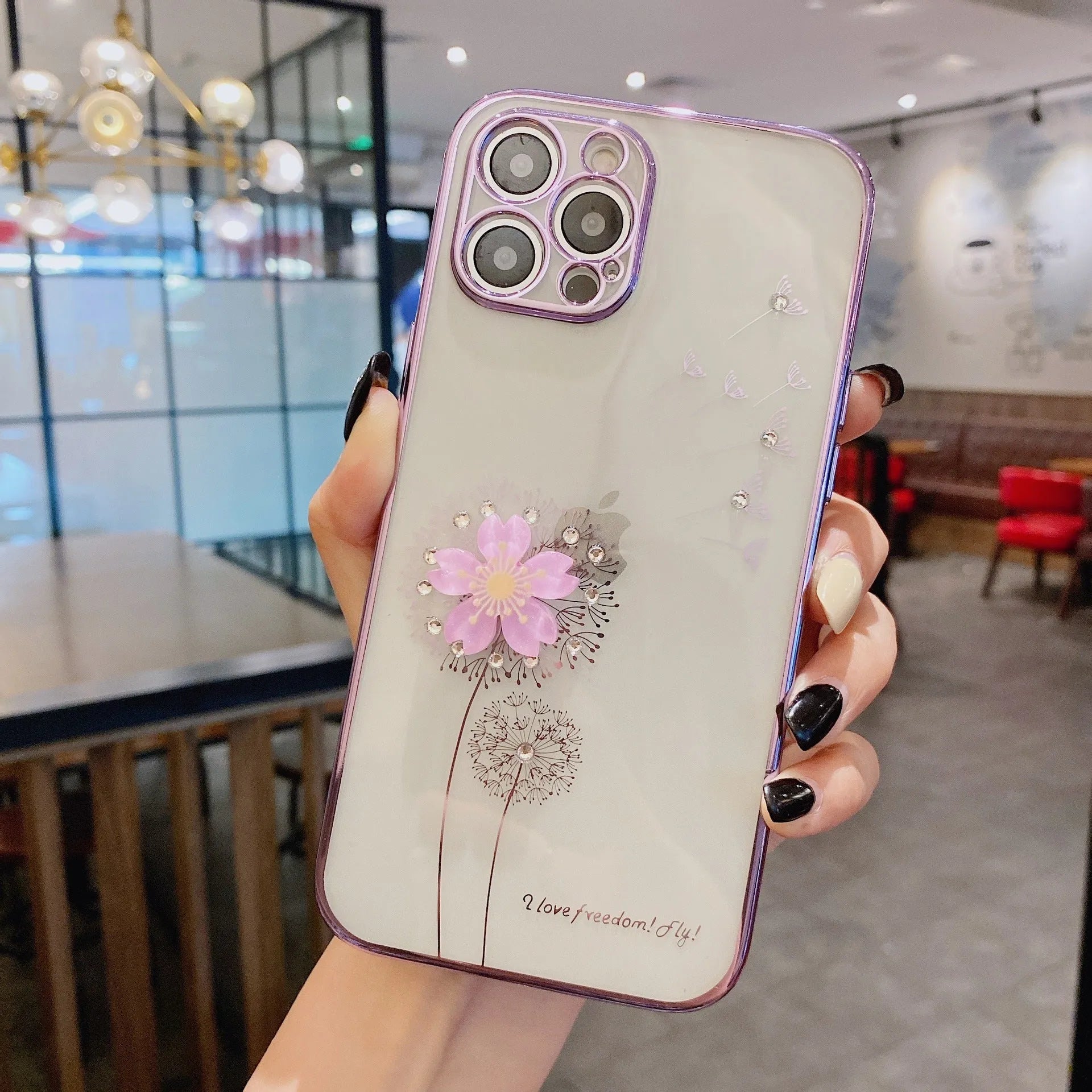 Green iPhone case with a 3D floral spin stand on the back and a built-in screen protector.