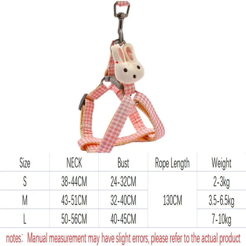 Blue nylon harness and leash set for a small dog with a quick-release buckle.