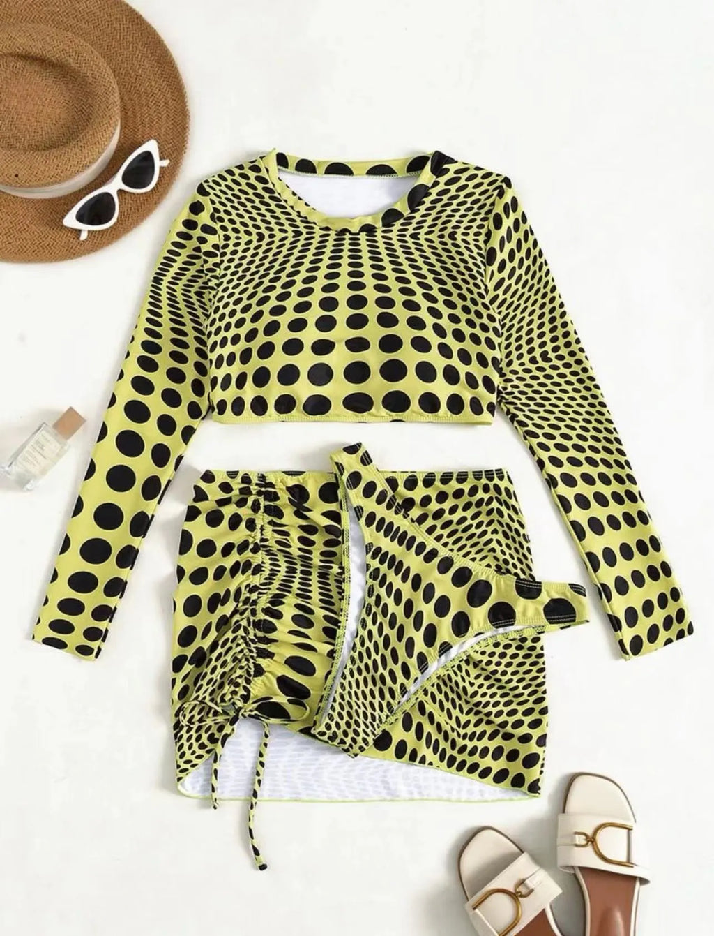 Women's green polka dot three-piece swimsuit set with skirt and padded bikini top