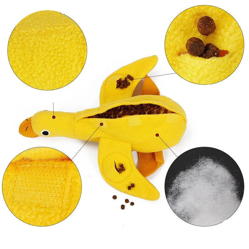 Yellow plush duck dog toy with a treat compartment and built-in sound module for training and enrichment.