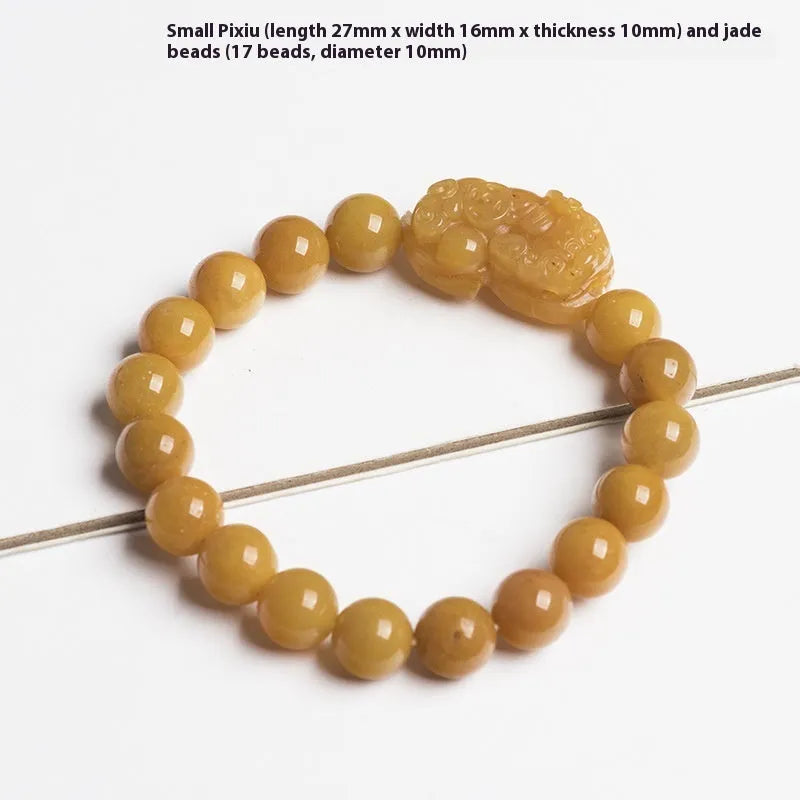 Carved Jinsi jade money bracelet showing golden thread texture and bead details