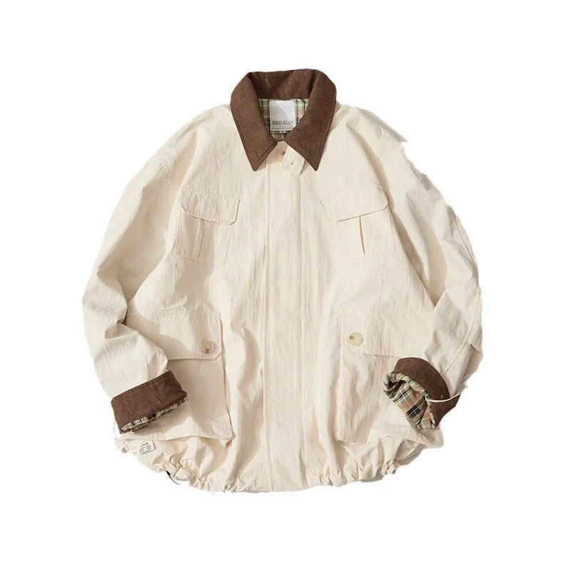 Men's and women's apricot and green polyester casual jacket with contrast panels and side pockets.