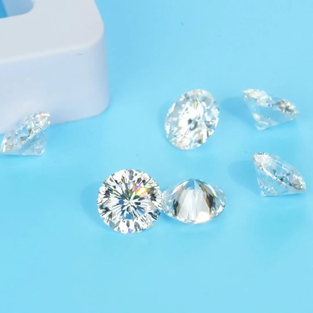 Round moissanite gemstone with eight hearts and eight arrows faceting pattern on dark background