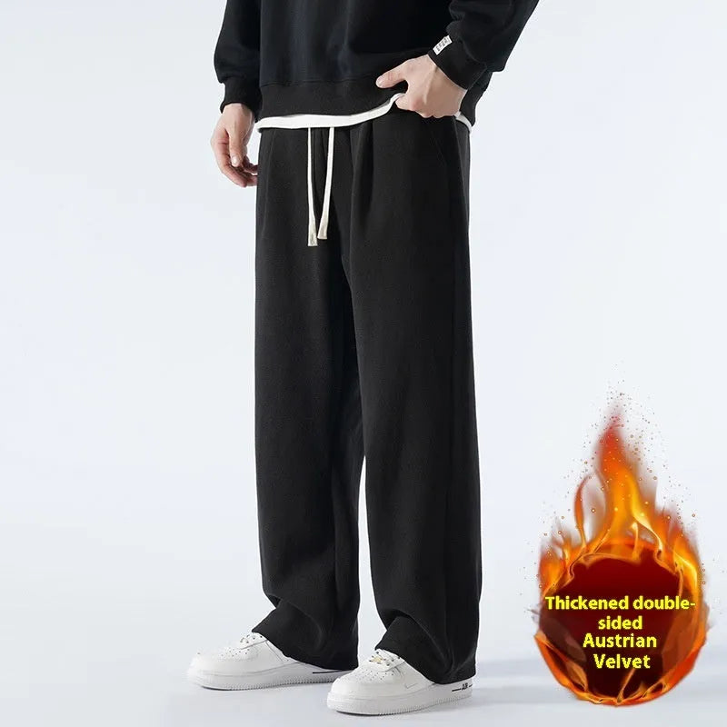 Men's apricot coloured fleece-lined loose fit sports trousers with an elasticated drawstring waist.