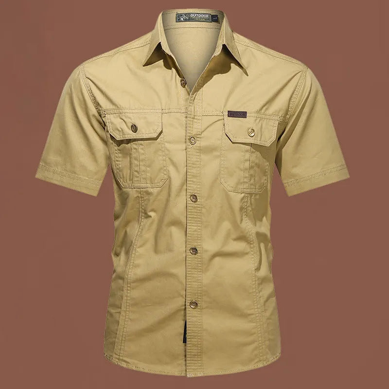 Men's cotton short sleeve work shirt in loose fit with non-iron treatment shown in multiple colour options