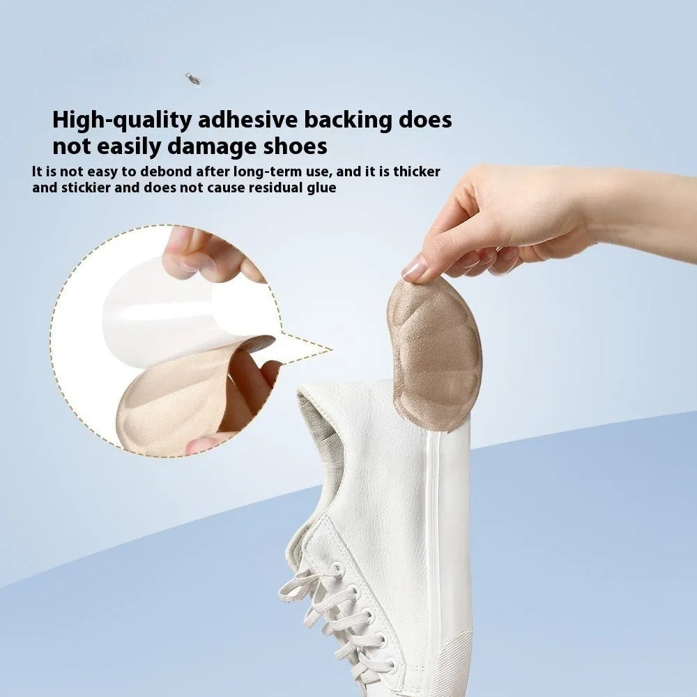 Three pairs of camel-coloured suede heel cushion pads with adhesive backing, each measuring 9.3x6cm