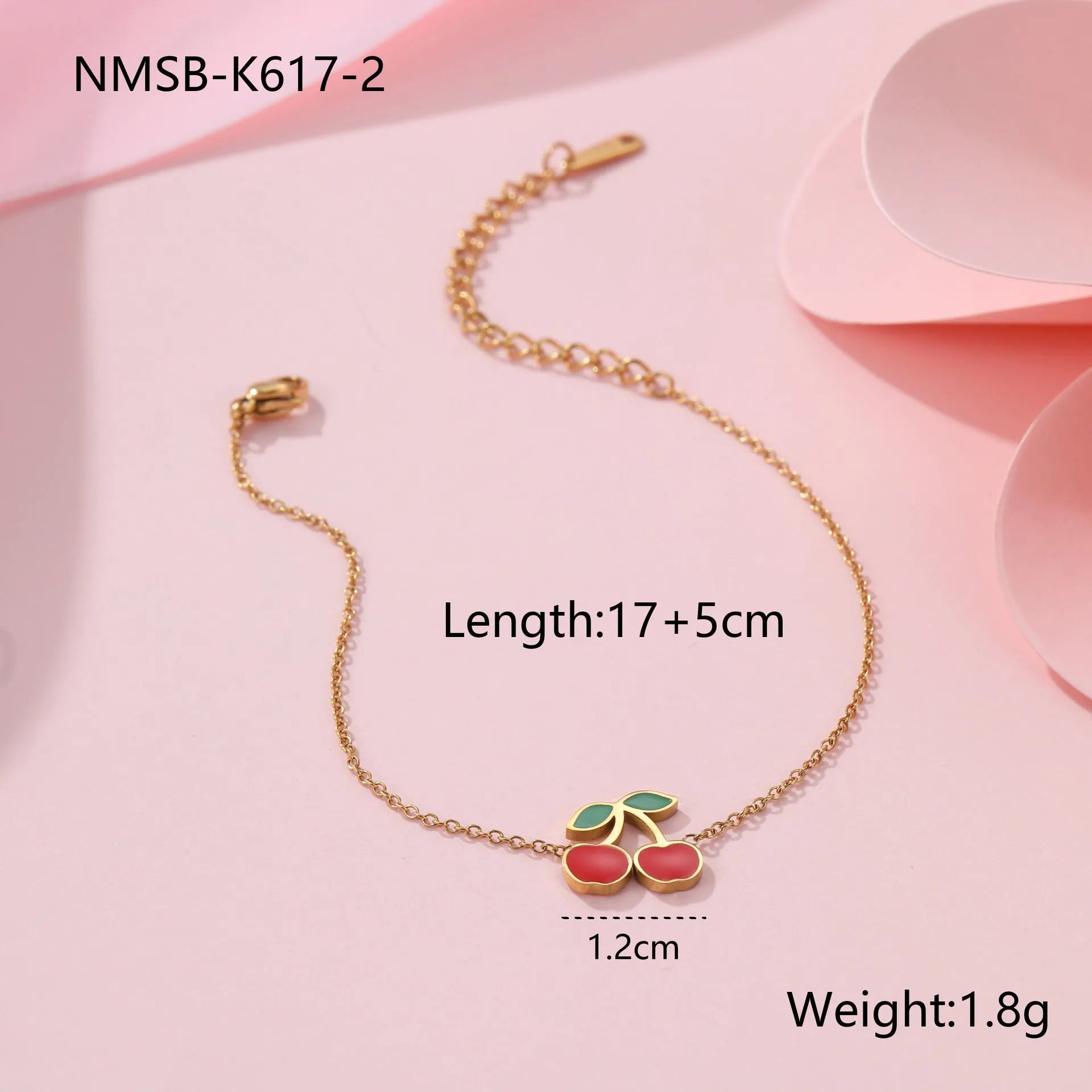Cherry design stainless steel necklace, bracelet, earrings, and ring set with 18K electroplated finish.