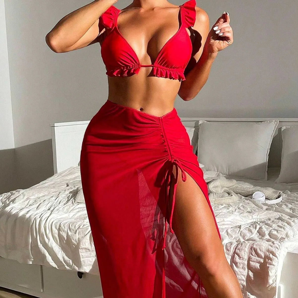 Women's printed split bikini three-piece swimsuit set with a skirt, shown in multiple colour options.